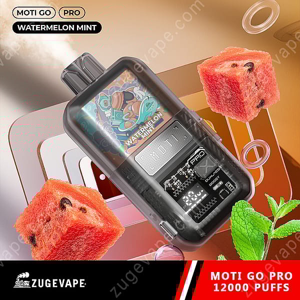 A Close-Up Of A Moti Go Pro Vape Device Labeled &Quot;Watermelon Mint&Quot; Alongside Pieces Of Fresh Watermelon And Mint Leaves, With A Colorful, Vibrant Background.